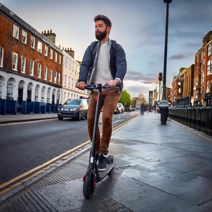 Firefly a young man riding an e-scooter in Dublin Ireland 90307